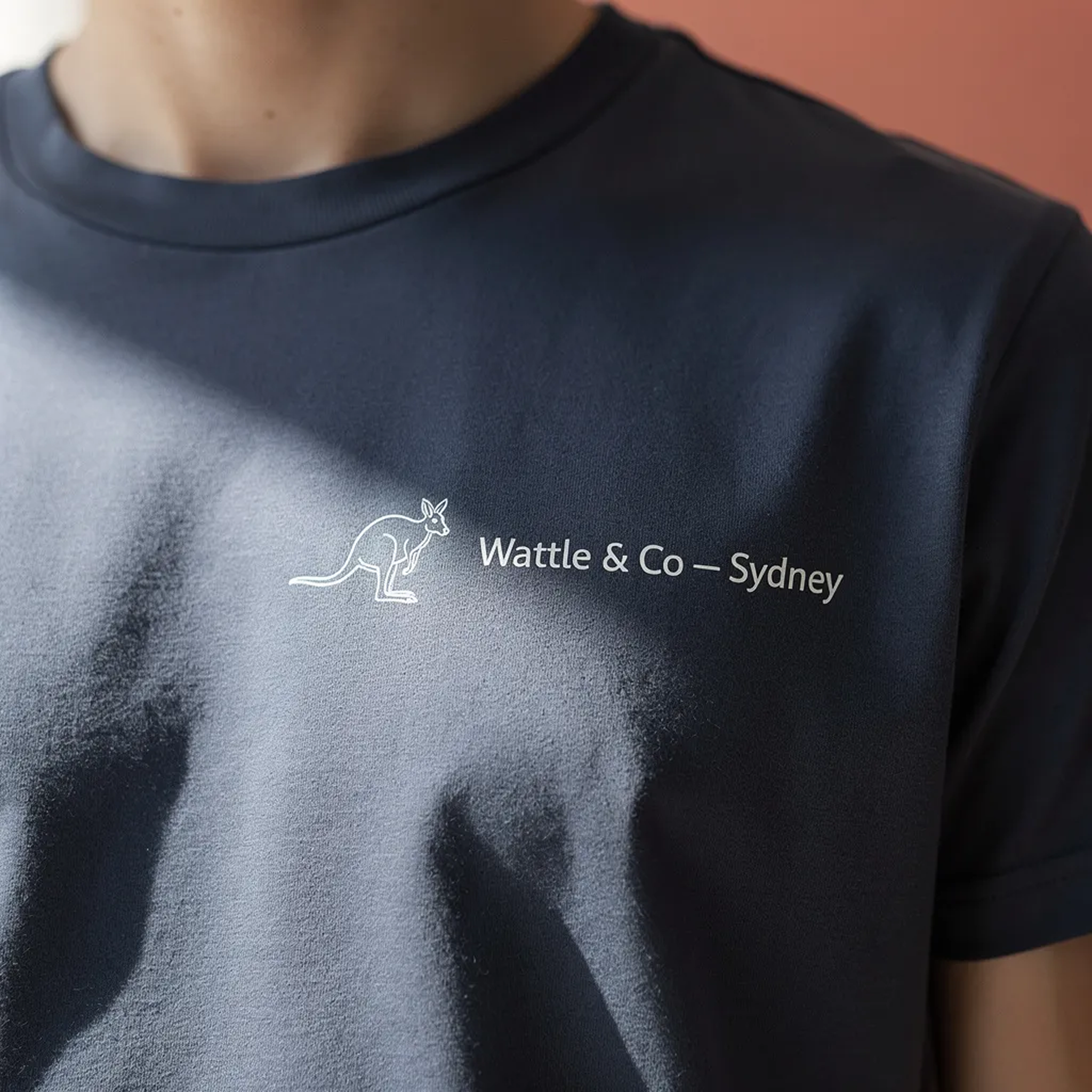 Close-up detail of custom printed corporate logo on t-shirt