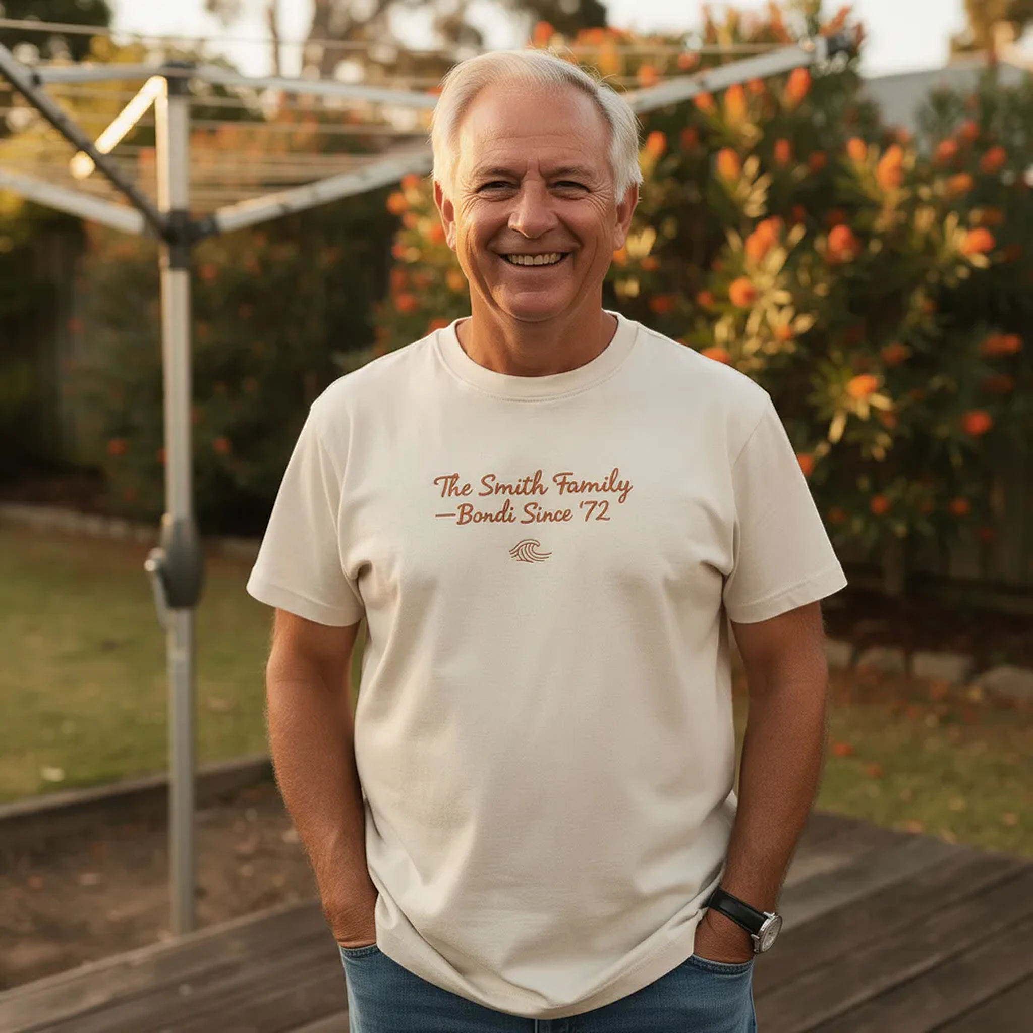 Man wearing custom family reunion t-shirt in backyard